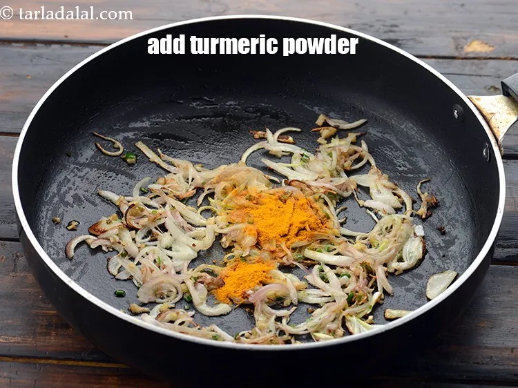 Step 29 – Add 1/2 tsp&nbsp;<a href="https://www.tarladalal.com/glossary-turmeric-powder-haldi-645i">turmeric powder (haldi)</a>.&nbsp;