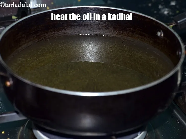 Step 47 – Heat the oil in a kadhai.&nbsp;