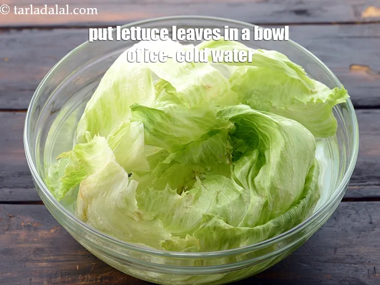 Step 79 – In burger crisp lettuce is very important so make sure you submerge the lettuce in …