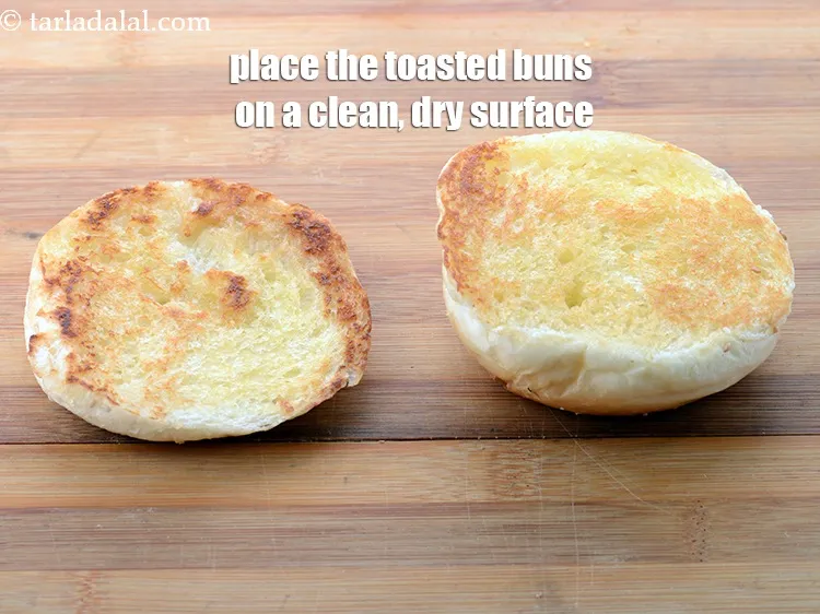 Step 64 – Place the toasted burger buns on a clean,dry surface.