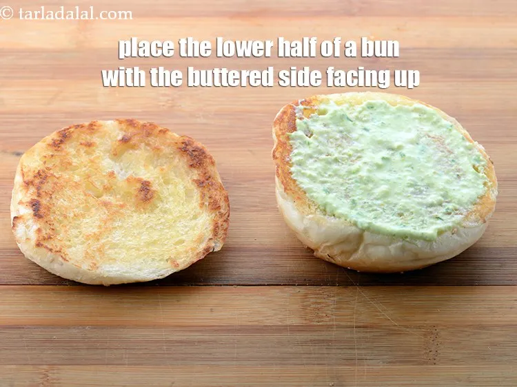 Step 66 – Place the lower half of a bun on a clean, dry surface with the buttered …