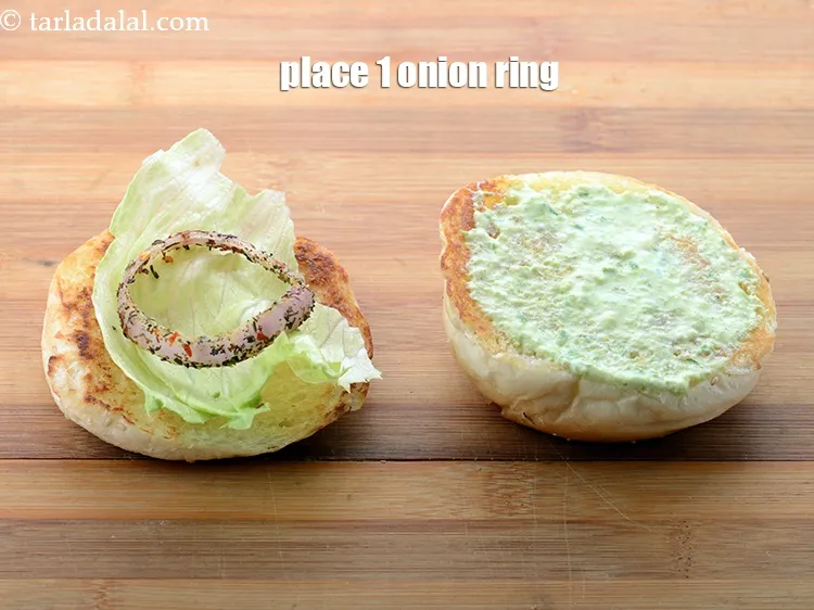 Step 68 – Place 1 onion ring over it.