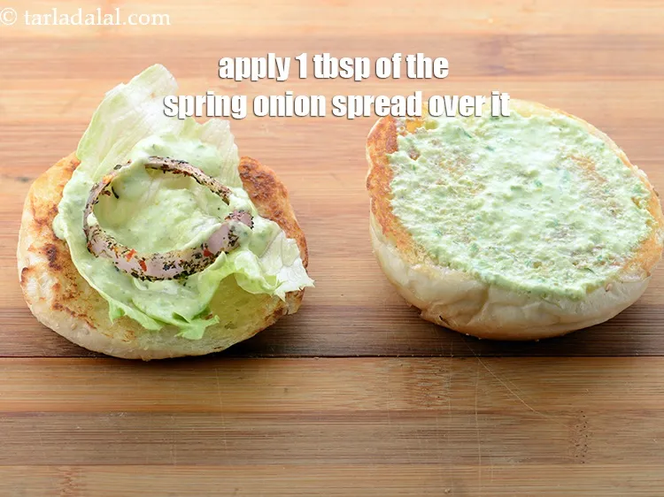 Step 69 – Apply 1 tbsp of the spring onion spread over it.