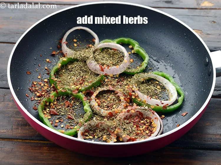 Step 55 – Add 1 tbsp&nbsp;<a href="https://www.tarladalal.com/glossary-dried-mixed-herbs-466i">dried mixed herbs</a>.