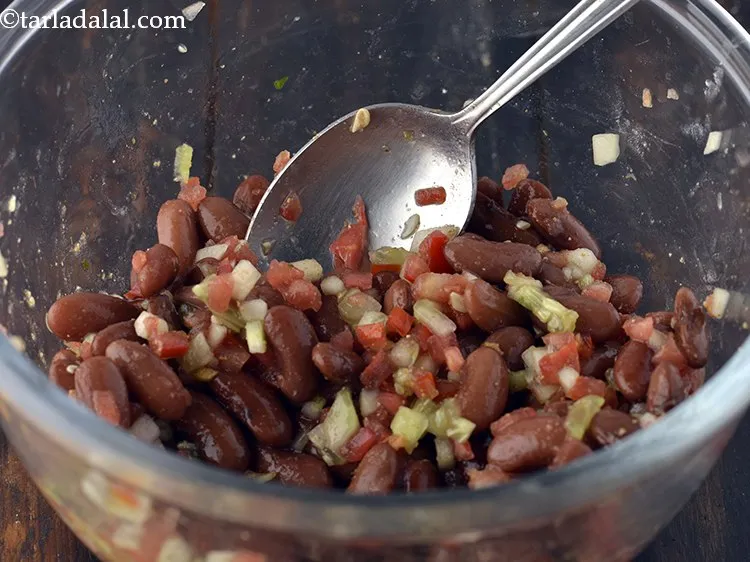 Step 11 – Mix&nbsp;<strong>Rajma Salad for Baby and Toddlers</strong><strong>&nbsp;</strong>well using a spoon.