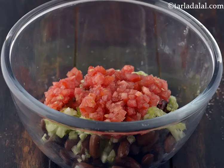 Step 7 – Add chopped tomatoes to&nbsp;<strong>Kidney Bean Salad for babies and toddlers</strong>.