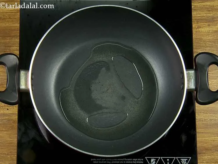 Step 22 – For making the&nbsp;<strong>rasawala dhokla recipe |&nbsp;Gujarati style rasawala dhokla |&nbsp;khaman dhokla in rasa |</strong>&nbsp;heat the …