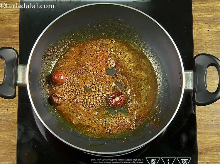 Step 27 – Add the turmeric powder and saut&eacute; on a medium flame for 30 seconds.