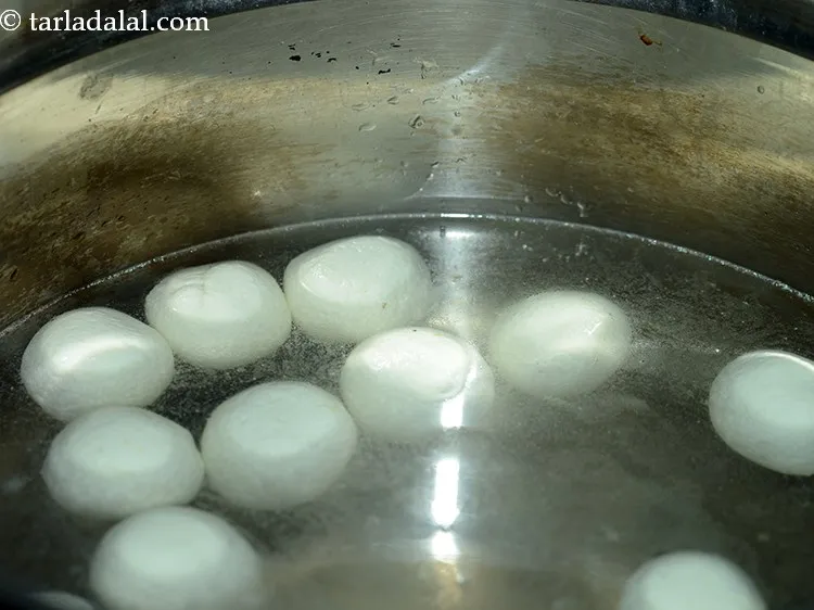 Step 23 – Put the chenna balls into the sugar water.