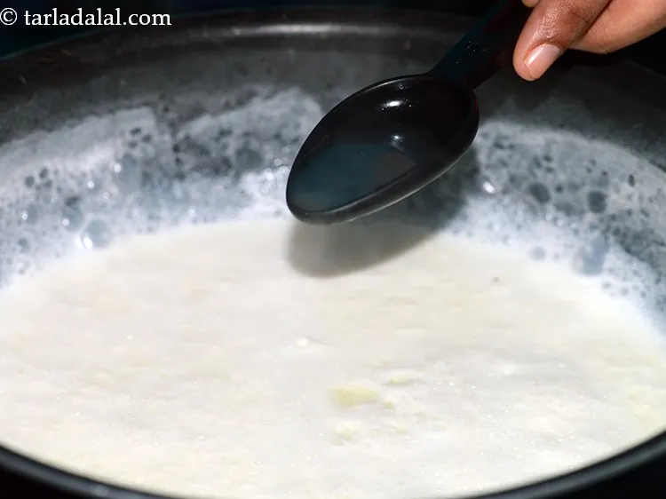 Step 4 – Add the lemon juice gradually to the milk. Excess might make the paneer chewy.
