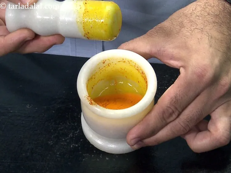 Step 3 – Meanwhile, combine the saffron and warm milk in a small bowl or mortar-pestle (khalbhatta), mix …