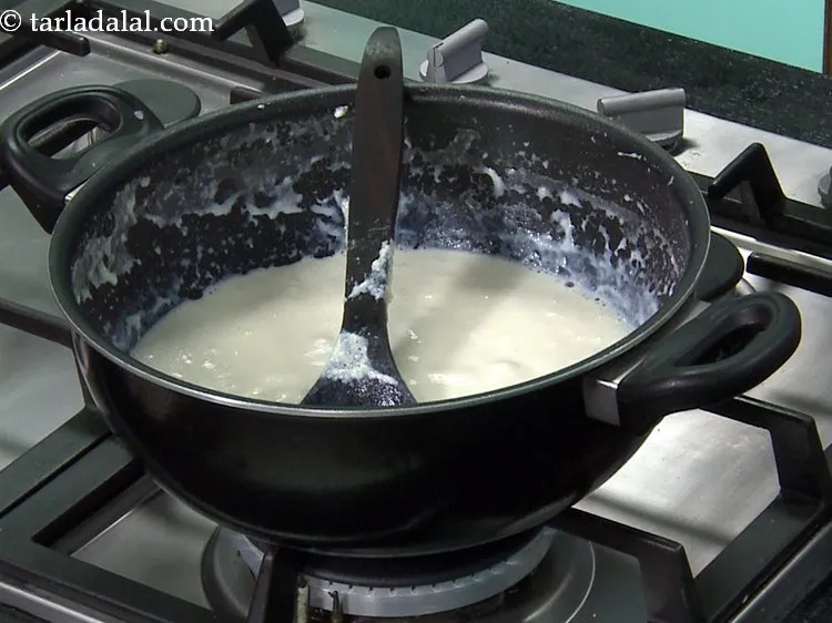 Step 4 – Add the sugar to the boiling milk, mix well and cook on a medium flame …