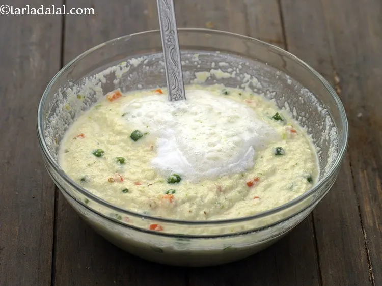 Step 36 – Add 2 tsp of water over the batter. This helps in the activation of fruit …