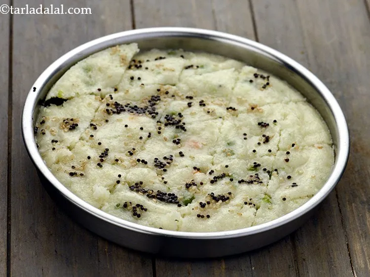 Step 31 – Cut into equal sized pieces. Once the&nbsp;<strong>Rava Vegetable Dhoklas</strong>&nbsp;is cooked, allow it to cool before …