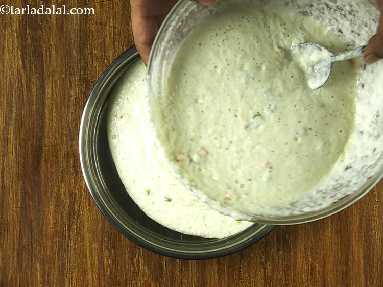 Step 21 – Pour one portion of the batter immediately into a 175 mm. (7&rdquo;) greased thali. Don&rsquo;t …