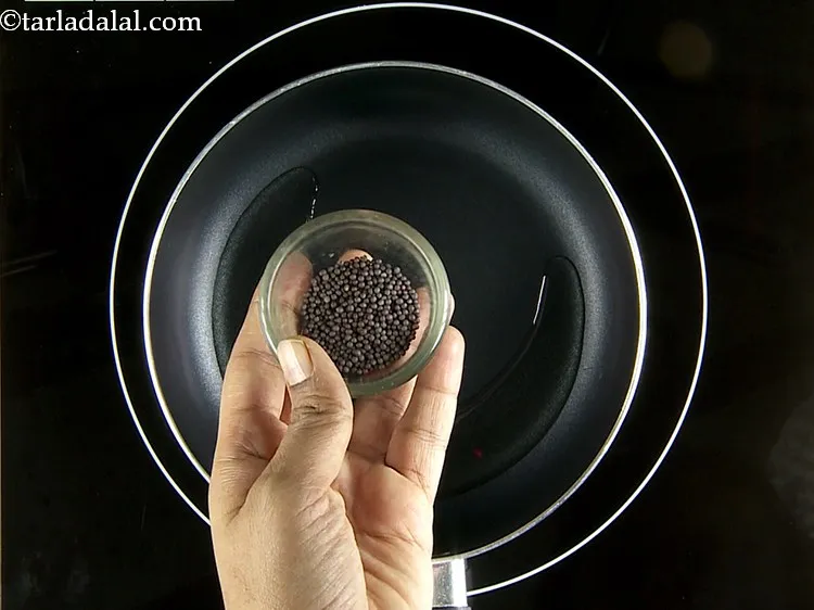 Step 27 – Add the mustard seeds.