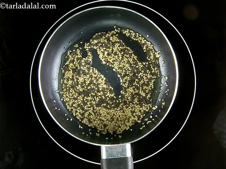 Step 29 – Add the asafoetida and saut&eacute; on a medium flame for a few seconds.