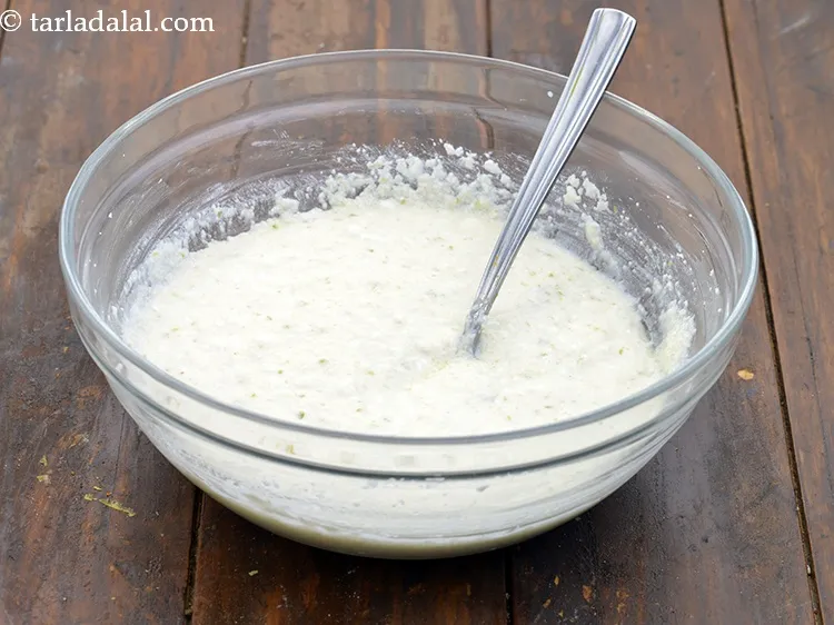 Step 9 – Mix well with a spoon. Ensure that the batter is lump free.&nbsp;