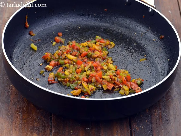 Step 22 – Saut&eacute; on a medium flame for 1 to 2 minutes. Keep the filling aside.<br /> …
