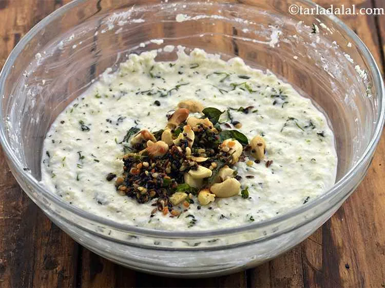 Step 19 – Add the tempering to the batter. Since the rava absorbs a lot of water, if …