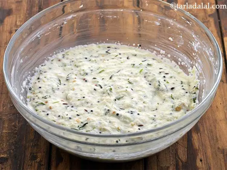 Step 20 – Mix the tempering into the &nbsp;<strong>Rava Idli </strong>batter.