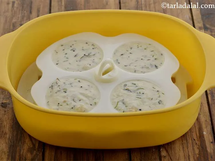 Step 24 – Place the idli mould in the microwave safe base, cover it and microwave on high …