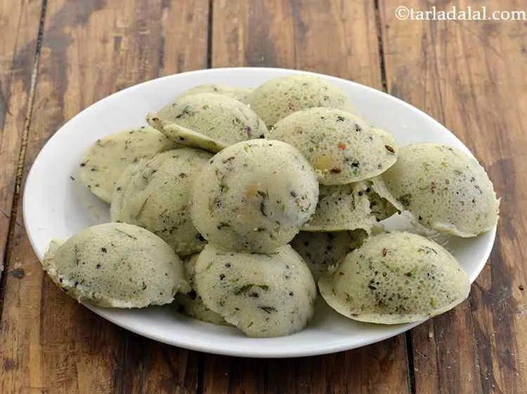 Step 27 – Repeat with the remaining batter to make 12 more&nbsp;<strong>rava idlis in microwave | microwave sooji …