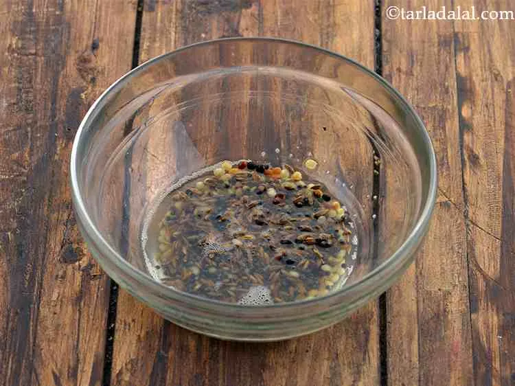 Step 12 – Mix well and microwave on high for 2 minutes. This tempering can also be made …