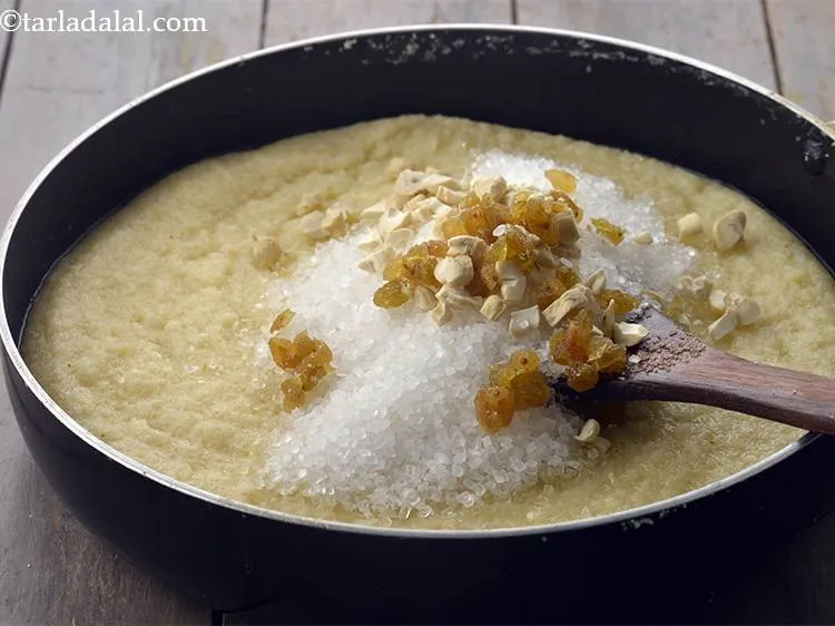 Step 9 – Add the chopped raisins and cashew nuts. You can also use other dry fruits like …