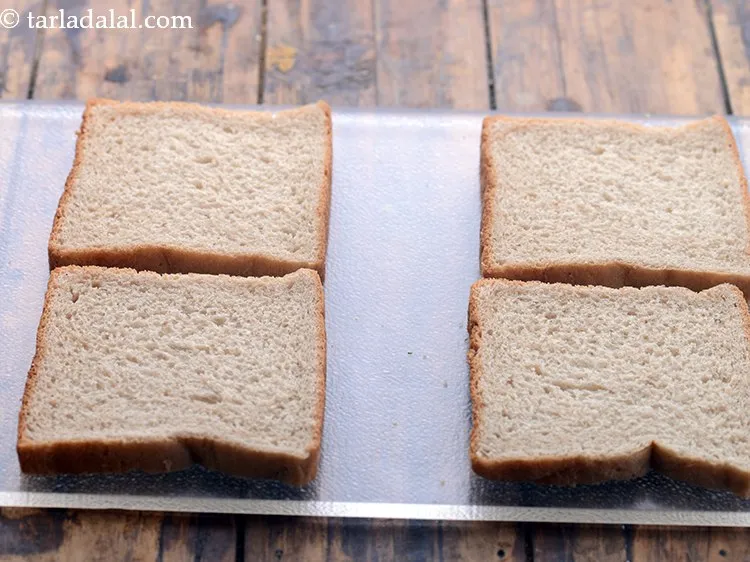स्टेप 11 – <strong>सूजी टोस्ट</strong> को असेम्बल करने के लिए, सभी ब्रेड स्लाइस …