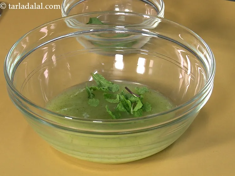 Step 14 – Add a few more <a href="https://www.tarladalal.com/glossary-mint-leaves-pudina-phudina-521i">mint leaves (phudina)</a>. The mint leaves will give a pleasant …