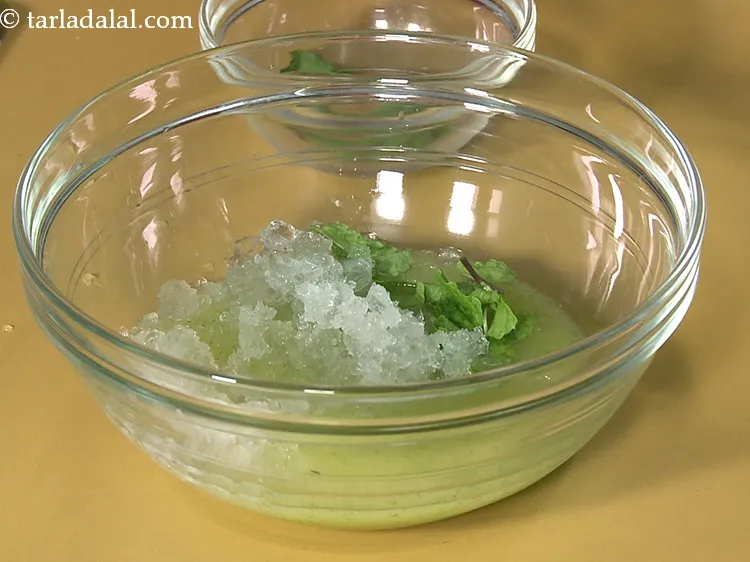Step 15 – Add 1/2 cup of <a href="https://www.tarladalal.com/glossary-crushed-ice-1944i">crushed ice</a>.