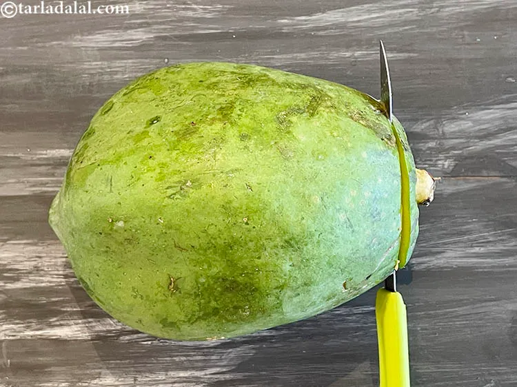 Step 3 – Wash the papaya and then cut one end of the papaya as shown in the …