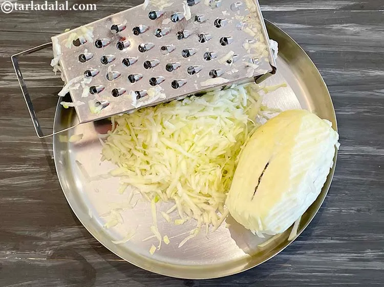 Step 5 – <meta charset="UTF-8" />Grate the papaya using a grater. We want thickly grated papaya for the …