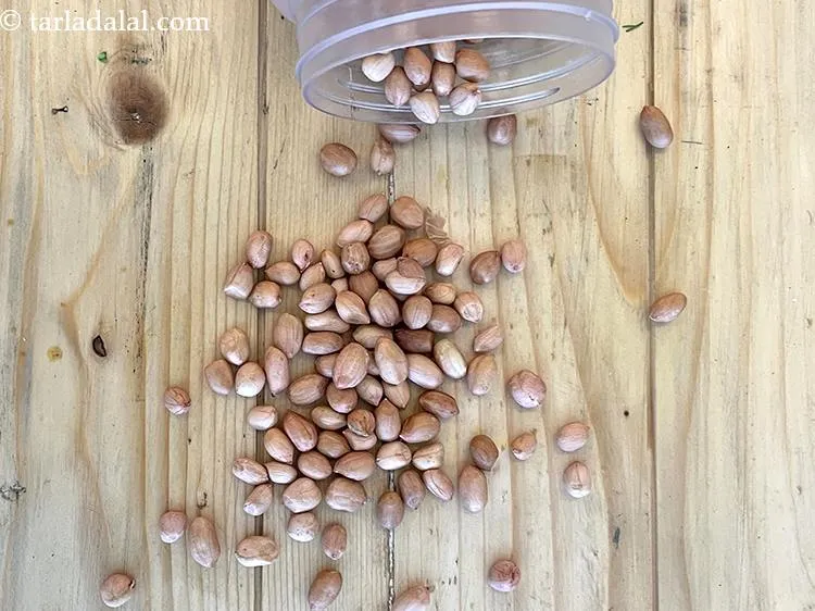 Step 12 – Add 3 tbsp&nbsp;<a href="https://www.tarladalal.com/glossary-raw-peanuts-kachi-mungfali-kachi-moongfali-847i">peanuts</a>.