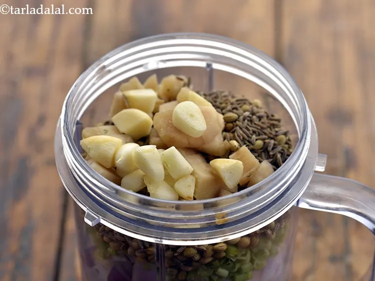 Step 10 – Add roughly chopped garlic.