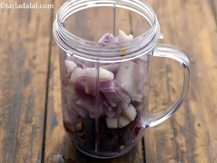 Step 6 – Add roughly chopped onions. You can make use of shallots also.