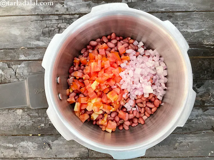 Step 66 – Add&nbsp;2 tbsp&nbsp;<a href="https://www.tarladalal.com/glossary-chopped-onions-722i">chopped onions</a>.