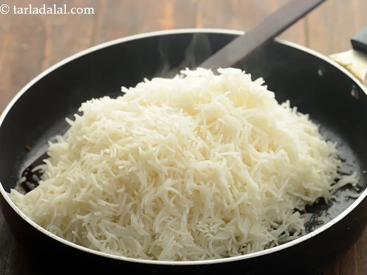 Step 13 – Remove the pan from the flame, add the cooked rice. If you add the rice …