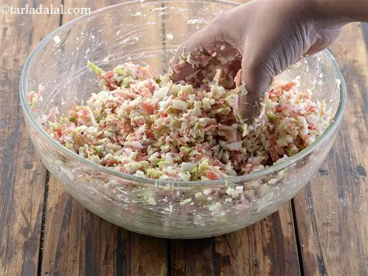 Step 10 – Start mixing the ingredients with your hands. It will first be a dry mixture.