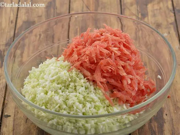 Step 3 – Then add grated carrot to it. Cabbage and carrot are the 2 most important ingredients …