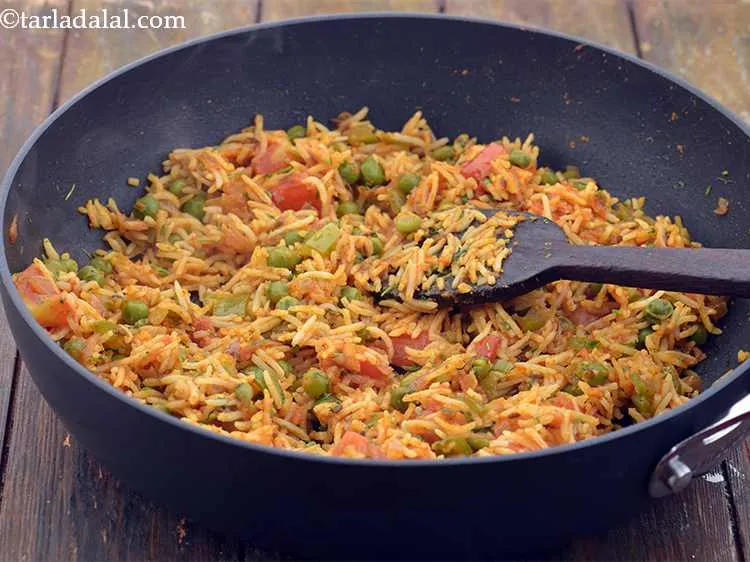 Step 13 – Add the lemon juice and mix&nbsp;<strong>tomato pulao recipe | tomato bath | restaurant style tomato …