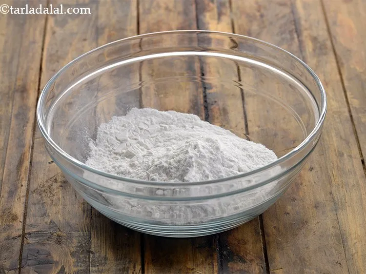 Step 1 – To prepare the dough for <strong>ribbon sev</strong>, in a deep bowl take rice flour. It …