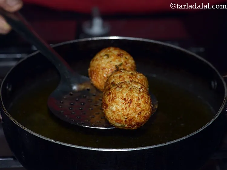 Step 13 – Slide a few balls in the hot oil carefully. Depending upon the size of kadhai …
