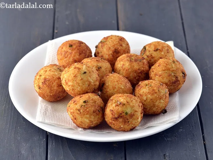 Step 14 – With the help of a slotted spoon, remove them and drain the <strong>rice and cheese …