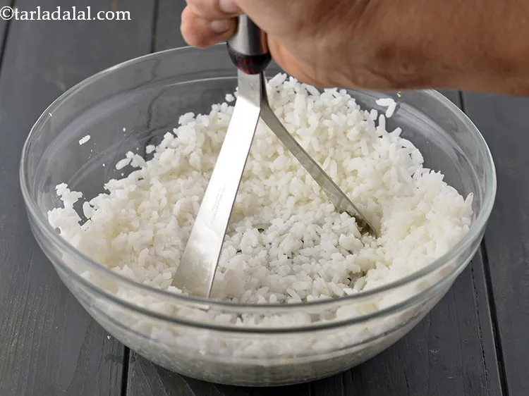 Step 3 – Mash the rice thoroughly in a deep bowl using a potato masher or you can …