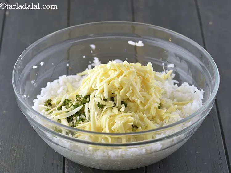 Step 7 – Add the grated processed cheese. Cheddar or Mozzarella cheese can also be used.
