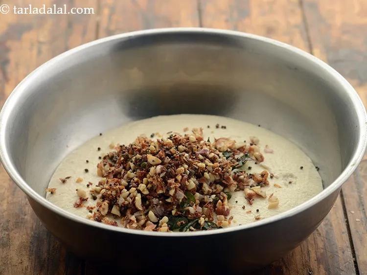 Step 23 – Add this tempering to the fermented batter and mix well.