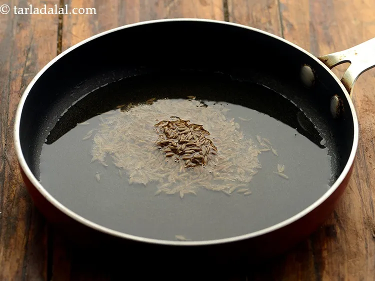 Step 14 – Add the cumin seeds.&nbsp;