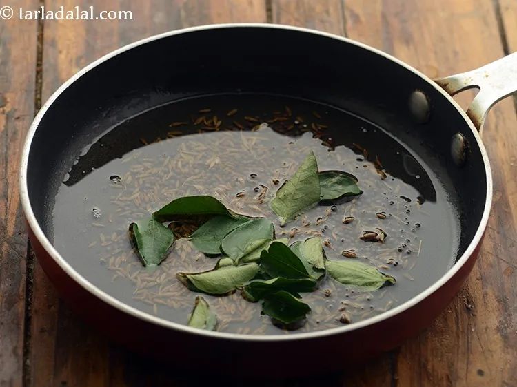 Step 16 – Add the curry leaves. Curry leaves gives a nice flavour and it is a must …
